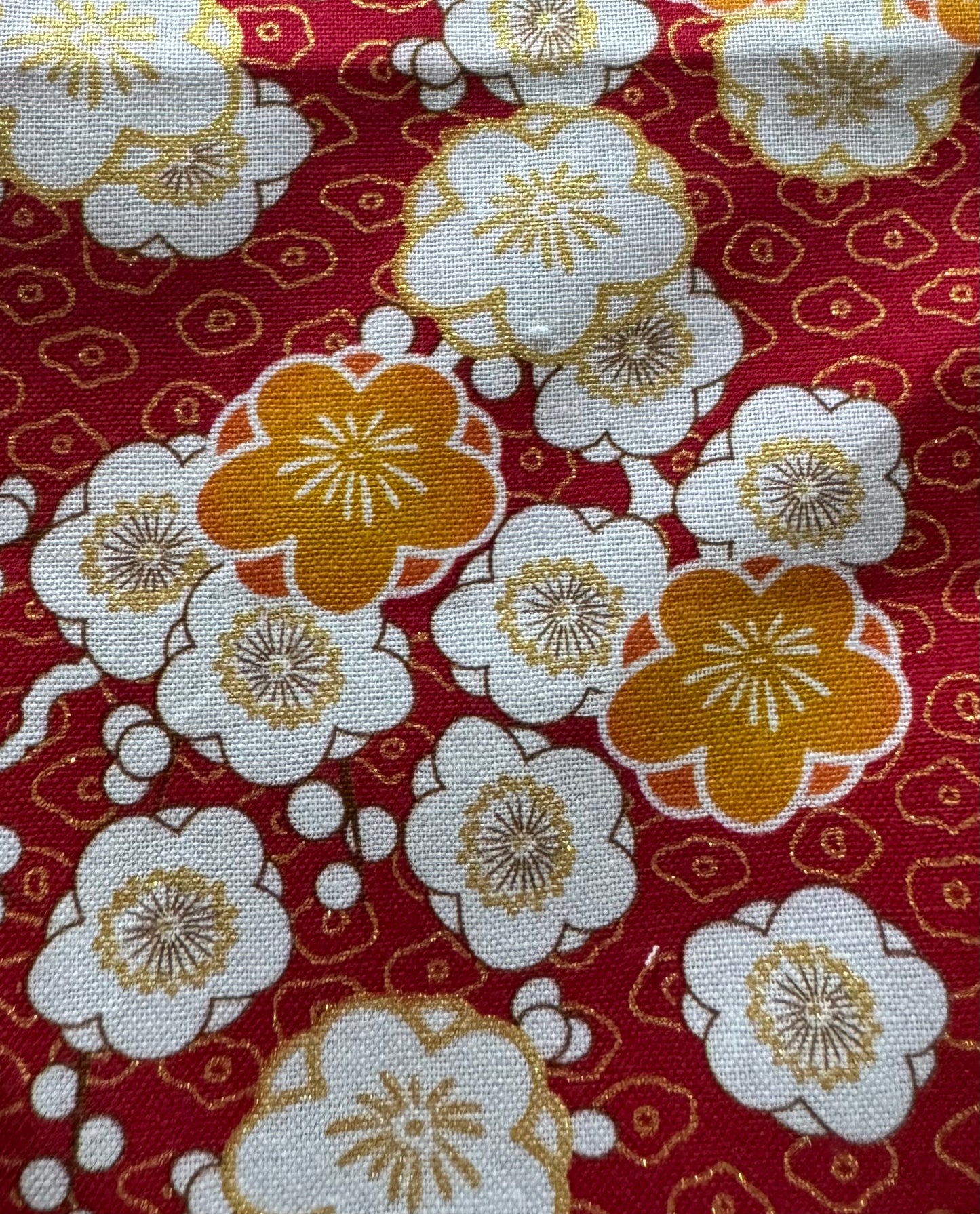 Fleur doré fond rouge